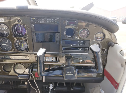 Passenger side yoke and instruments including trandsponder and radios.